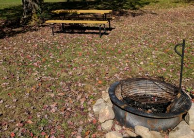 New River Tiny House hotel fire ring and picnic table