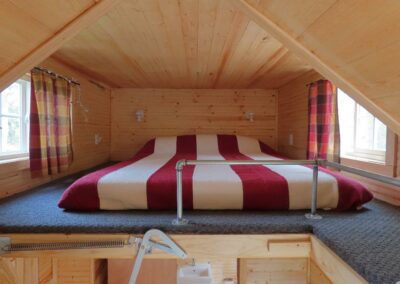 New River Tiny House hotel loft of tiny house with queen bed